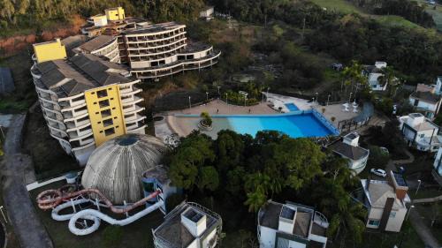 Aguas Mornas House | Casa de campo em resort com banheiras água termal