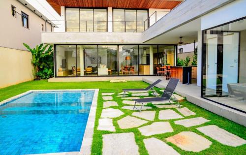 Jardim Acapulco House | Casa de Cinema no Guarujá - Condomínio Acapulco