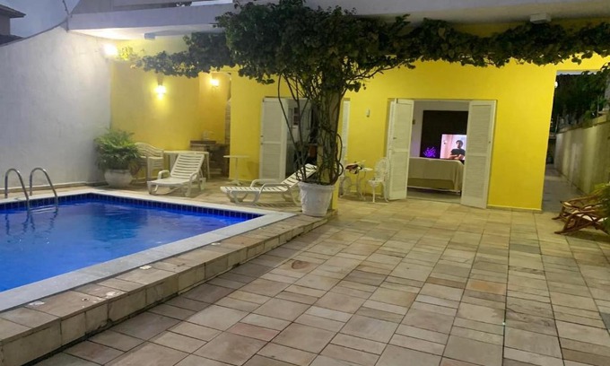 Jardim Centenario House | Casa de férias no Guarujá.