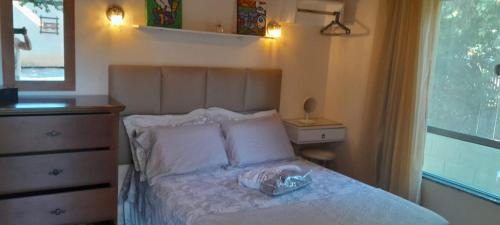 Praia Rasa Apartment | Casa de hospedes em condominio com lazer