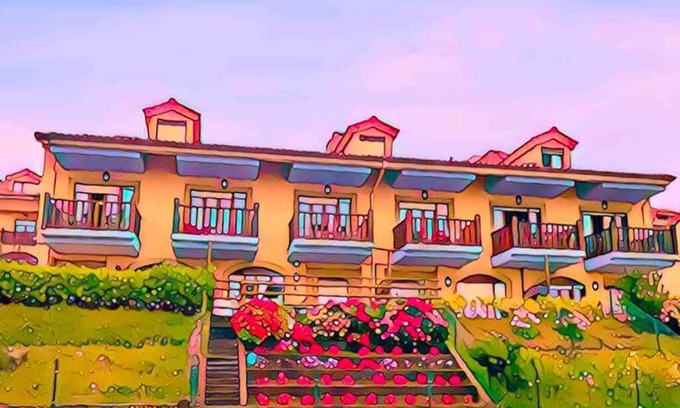 Comillas Apartment | Casa de Las Flores - Apartamento con jardín privado frente a la Playa de Comillas