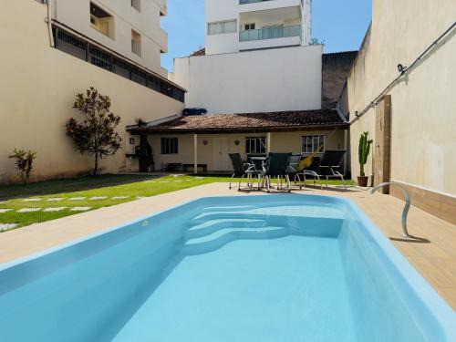 Praia do Morro Apartment | Casa de Praia com Piscina, quintal, lazer e churrasco, 3 quartos com ar condicionado, sendo 2 suites para sua familia!