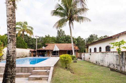 Morada da Praia House | Casa em Bertioga no Cond Morada da Praia com piscina