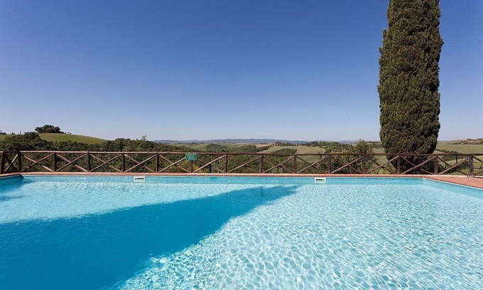 Asciano House | Casa Giobatta B: A characteristic and welcoming two-story age-old farm house surrounded by the greenery, with Free WI-FI.