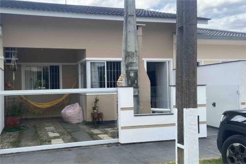 Palhoca House | Casa, mar e paz