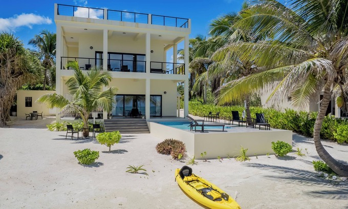 San Pedro House | Casa Paloma: Unwind in Style with Breathtaking Caribbean Views.