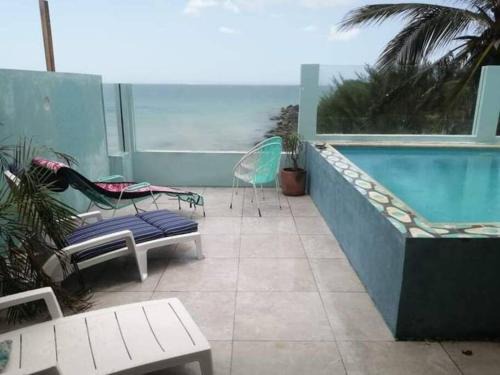 Puerto Yucalpeten House | Casa Rosa 2 bedroom beach fronted home with private pool