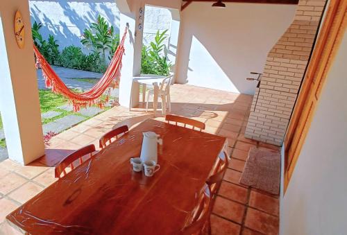 Estufa I House | Casa Temporada Ubatuba próxima à praia, check-in e out flexíveis com 5 vagas na garagem, wifi