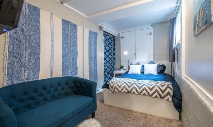 Fremont Apartment | Central 2 bedroom unit with 3 beds and 3 large TVs