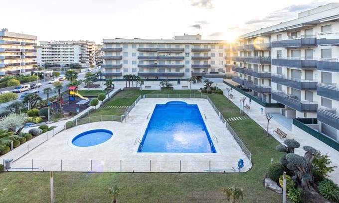 La Pineda Apartment | Central Apartment in La Pineda with Pool, Garden, Playground, and Terrace
