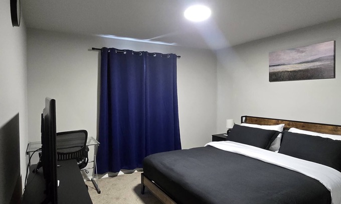 Spokane House | Centrally located Grand Bedroom for you to experience home away from home.