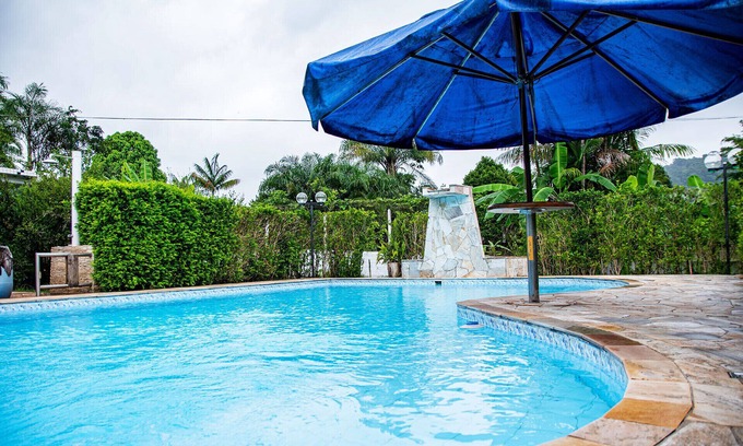 Peruibe House | Chácara com piscina, churrasq e WiFi em Peruíbe/SP