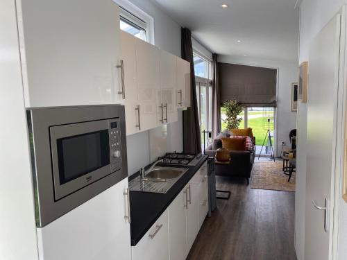 Lathum Ski Chalet | Chalet in Gelderland with Spacious Garden, cleaning included