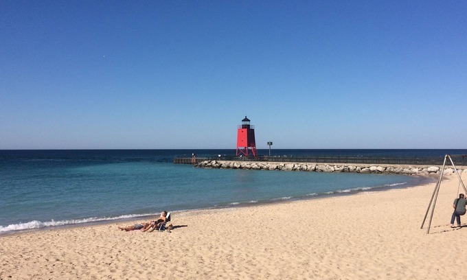 Charlevoix Villa | Charlevoix Mushroom Thatch House. Walk to Downtown. Beach Across the Street!