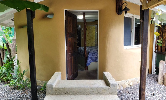 Runaway Bay Cottage | Charming 1-BR cottage w/WiFi and AC w/pool and beach access in Runaway Bay