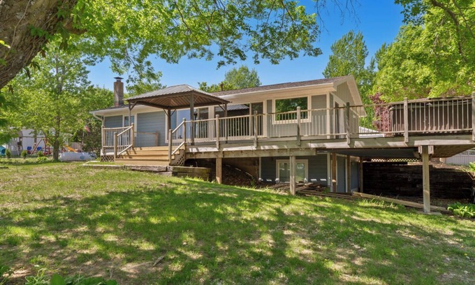 Webster House | Charming 3-bedroom Lake House with dock, hot tub, AC in delightful Waterville