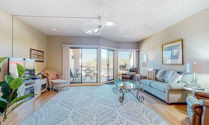 Shelter Cove Villa | Charming bay view villa with pool, washer/dryer, balcony, TV, & full kitchen