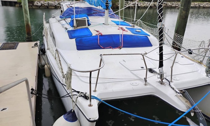 Key West Boat Rental | Charming catamaran sailboat with AC, pool in stock island yacht club, Key West.