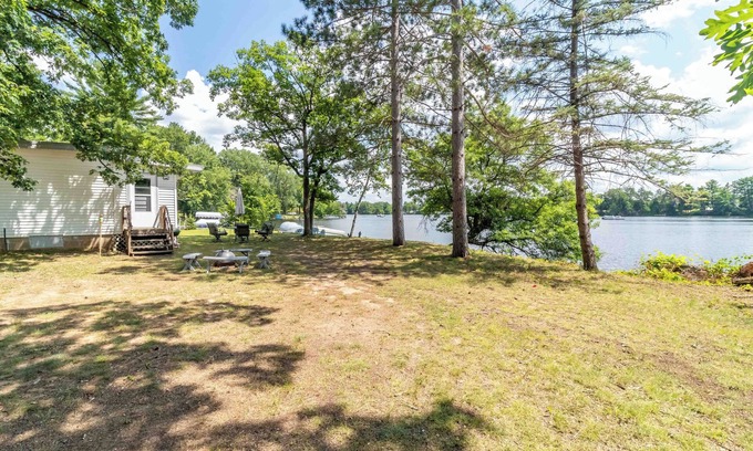 Friendship Cottage | CHARMING COTTAGE ON ROCHE-A-CRI LAKE WITH PRIVATE PIER AND BEACH - PET FRIENDLY