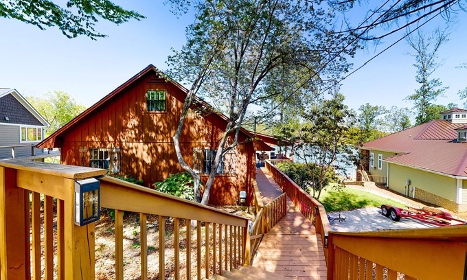 Big Creek House | Charming dog-friendly lakefront home w/dock, firepit, huge deck