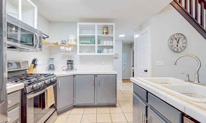Blairsville Cabin | Charming home lined by trees with a large deck, grill, firepit, & pool table