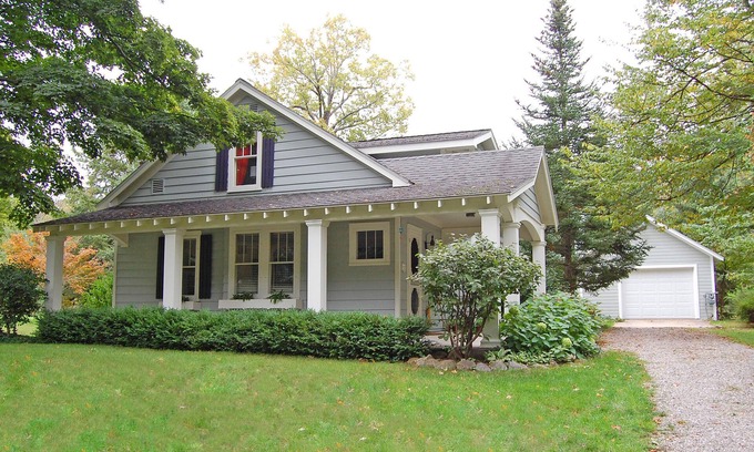 Maple City Cottage | Charming home near Glen Arbor with a porch, gas grill, lake views, & AC