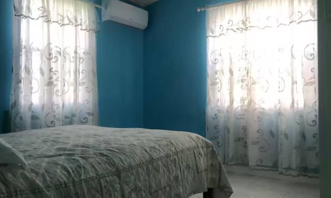 Ruby House | Charming house in terrific Long Bay with AC, WiFi