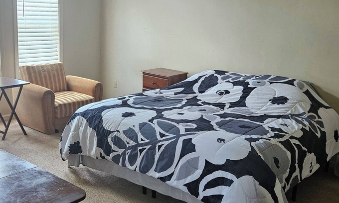 Kansas City House | Charming master bedroomin in a house in Kansas City