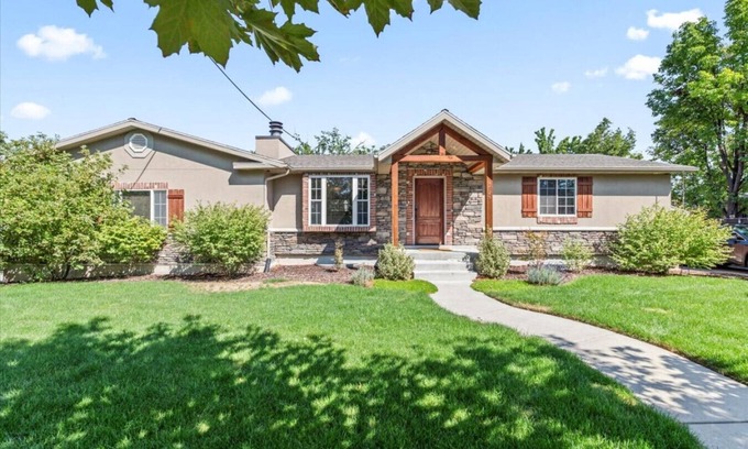 Millcreek House | Charming Mountain Retreat with Enclosed Backyard and Artistic Flair