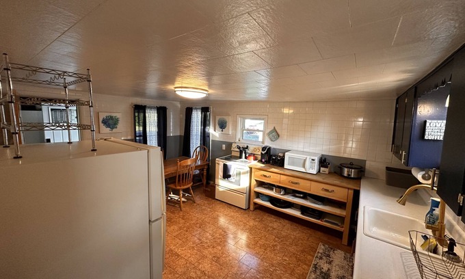 Washburn House | Charming New England Cape just feet from Snowmobile and ATV Trails!
