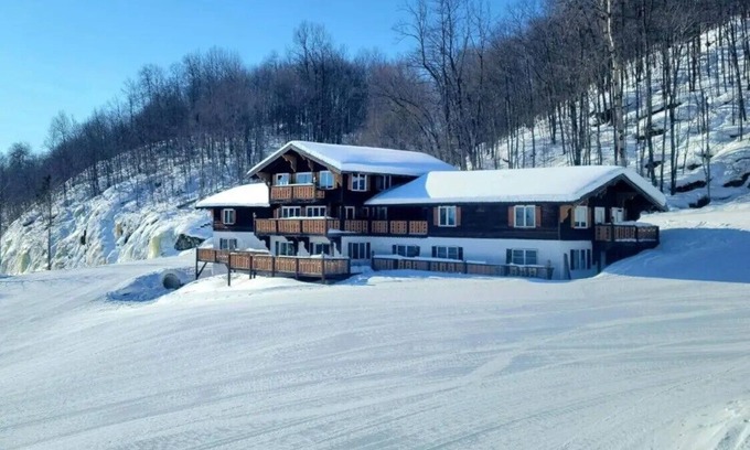 Upson Ski Chalet | Charming, ski-in, ski-out, lake-view chalet w/10 bedrooms, kitchen and AC.