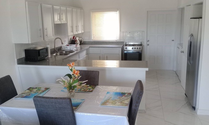 Rock Sound Apartment | Charming unit 2 - 2 bedroom apartment in cool Rock Sound with AC