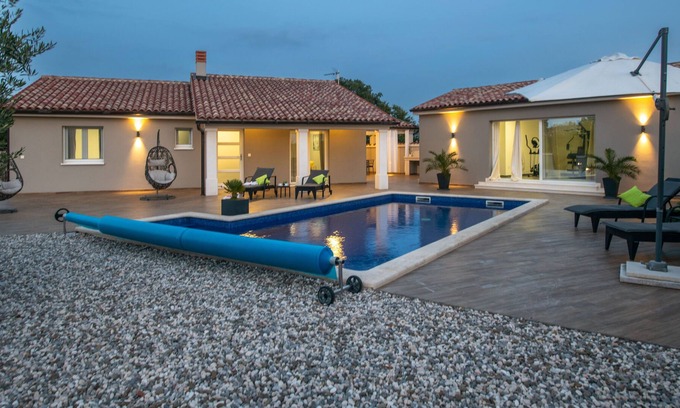 Filipana Villa | Charming villa Caerus with heated pool, sauna, children's playground