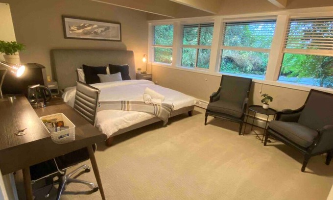 Caulfeild House | Cheerful master bedroom in Cedar Woods!