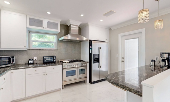 Bel Air House | Cheerful retreat near beaches and nightlife with large patio, dog friendly