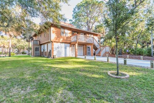 Saint Helena Island House | Cheery home with fire-pit, screened-in porch - pets allowed