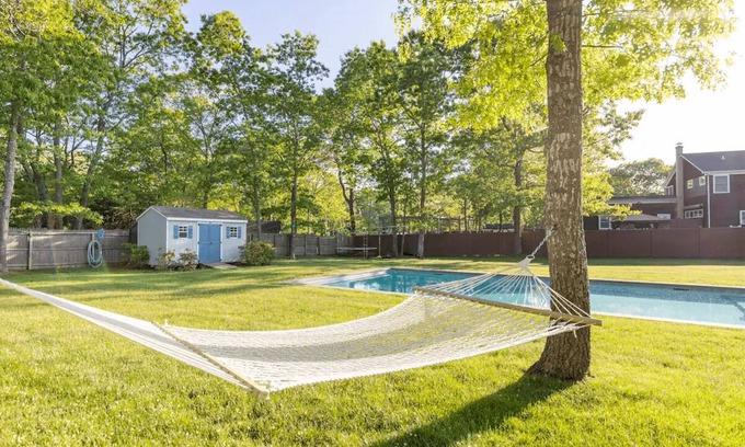 Hampton Bays House | Chic Hamptons Home with Heated Gated Pool and Grill