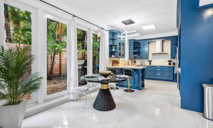Victoria Park House | Chic Retreat Heated Pool Floats Close to Beach