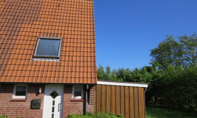 Norddeich House | Child friendly Terraced corner house near the dyke, bicycles, washing machine and WLAN
