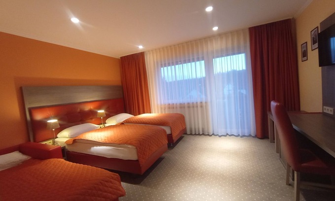 Donaueschingen Apartment | Classic family room, modern with balcony, 1 double bed + 1 single bed or 3 single beds