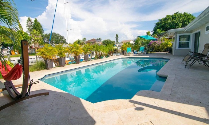 Coquina Key House | Classic Florida ranch, waterfront, heated pool & kayaks - no hurricane damage