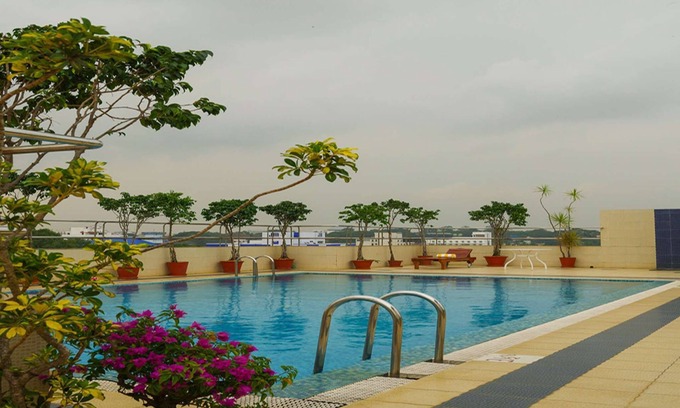 Karumom Hotel | Classic Sarovar Portico Thiruvananthapuram