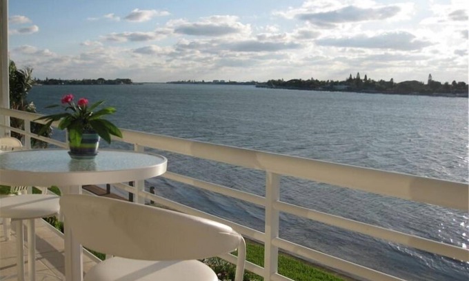 St. Petersburg Condo | CLUB BAHIA LUXURY WATERFRONT Condo View Sunsets, Dolphins, Manatee from balcony!