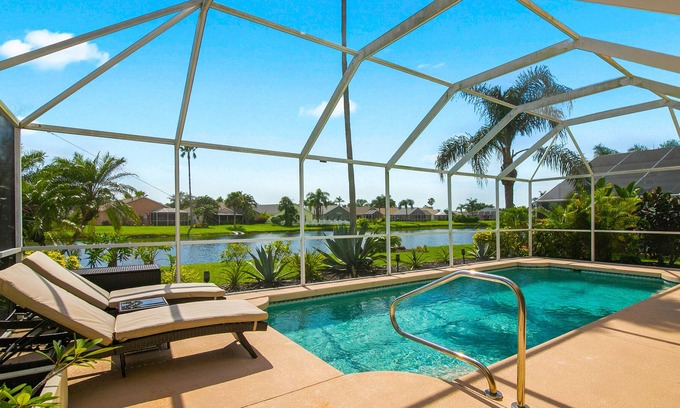 Sabal Harbour House | Coastal Charm: Lakefront Private Pool Near Beaches
