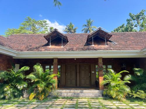 Devikolam House | Coconut Valley