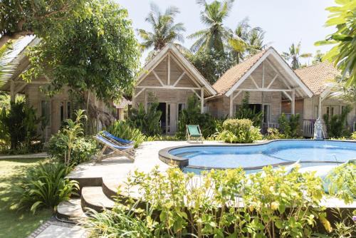 Jungut Batu House | Coconut Village Guest House Lembongan RedPartner