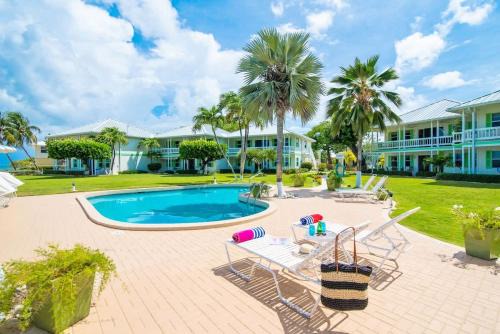 Seven Mile Beach House | Cocoplum #1 Condo