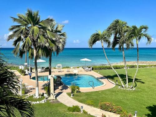Seven Mile Beach House | Cocoplum #8 Condo