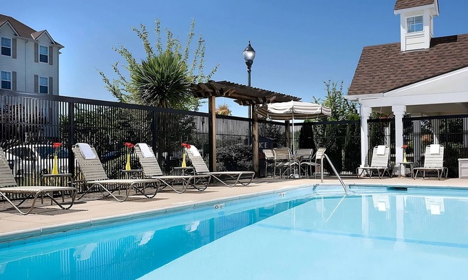 Renton Resort | Comfort & Convenience! Free Shuttle, Full Kitchen, Seasonal Outdoor Pool!