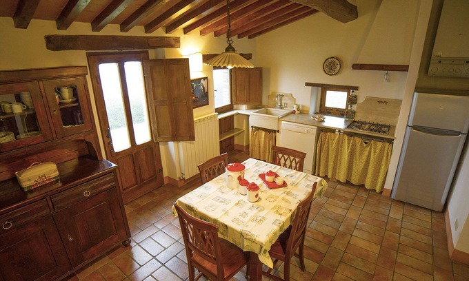 Radicofani Apartment | Comfortable apartment with garden in an old farmhouse with swimming pool